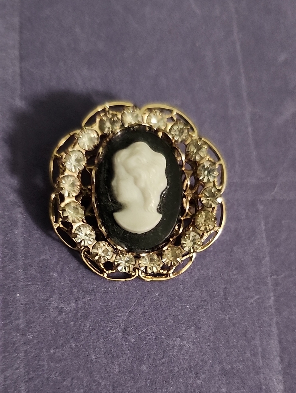 Vintage Gold-Tone Black and White Cameo Brooch with Clear Crystal Accents